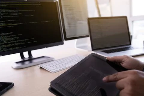 Programmer working Developing programming technologies Web Design Online Tech Stock Photos