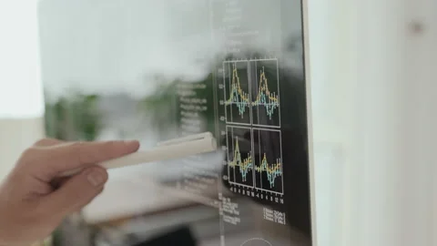 Programmer Working with Digital Chart on Computer Monitor Stock Footage 231478476