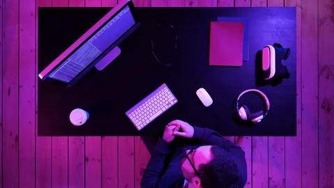 A programmer working on his computer having pain in his neck. Stock Footage 118982146