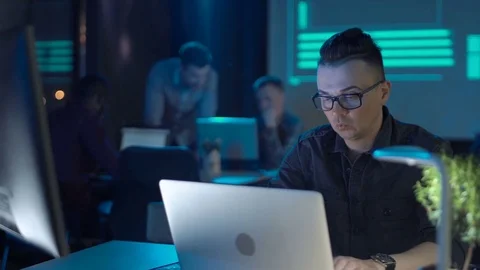 Programmer working at laptop Stock-Footage 74980537