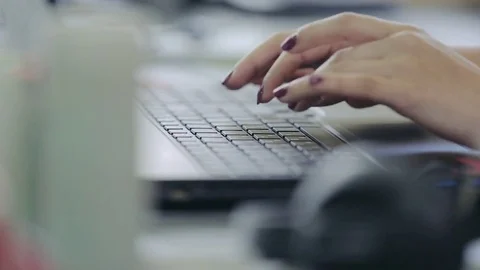 Programmer working on a laptop keyboard, close-up Stock Footage 75316766