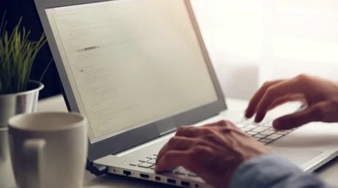 Programmer working on laptop in office Stock-Footage 68367299