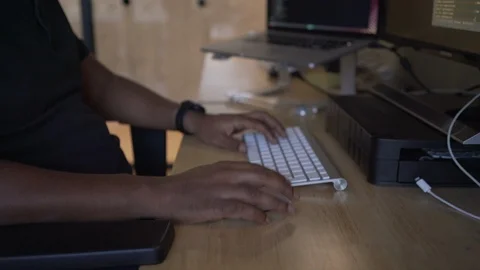 Programmer Working Late in the Office, Coding at his Desk, Reveal Face Stock Footage 126451287