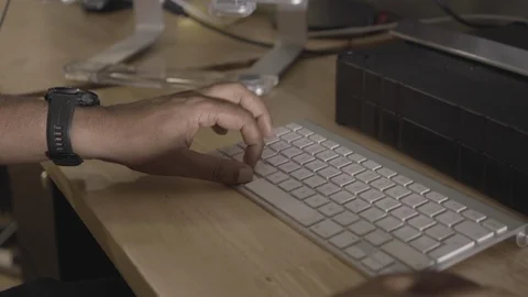 Programmer Working Late in the Office, Coding at his Desk, Reveal from Close Up Stock Footage 126457859