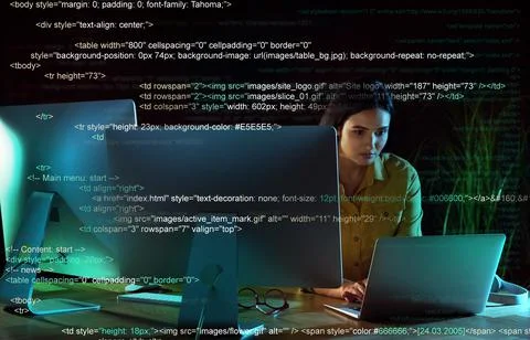Programmer working in modern office at night Foto stock
