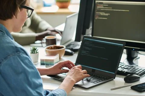 Programmer working with new software program Stock Photos