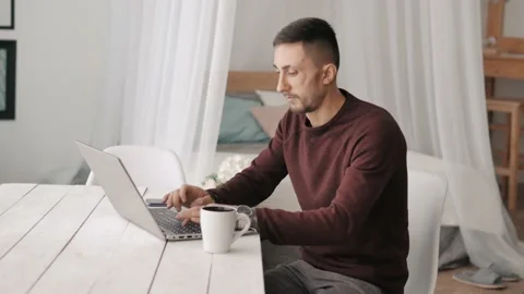 A programmer is working on the next big thing. Innovation is on its way Stock Footage 142571398