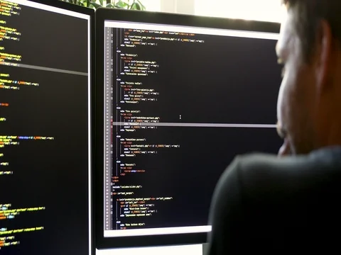 Free Stock Photo of Software developer programming code on screen