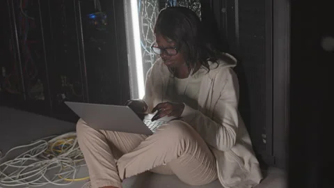 Programmer Working by Rack in Server Room Stock-Footage 162460706