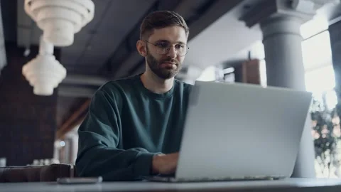 Programmer Working Remotely From Cafe, Portrait Of Freelancer Man Using Laptop 库存影片 343409260