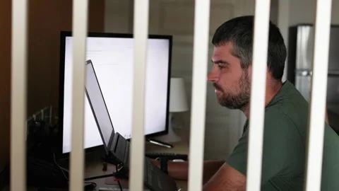 Programmer working remotely while focused on coding tasks Stock Footage 305833552