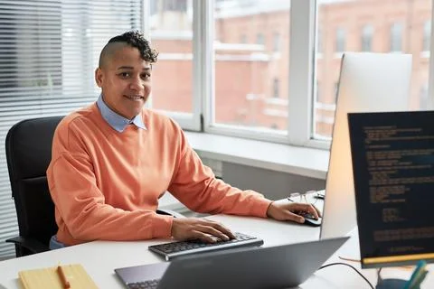 Programmer working with security codes on computer Stock Photos