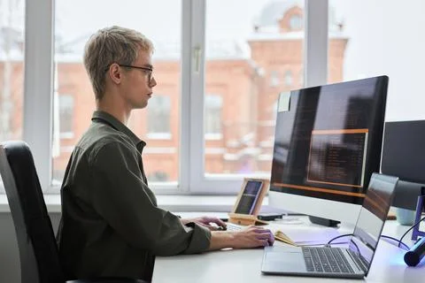 Programmer working with security codes for progrm Stock Photos