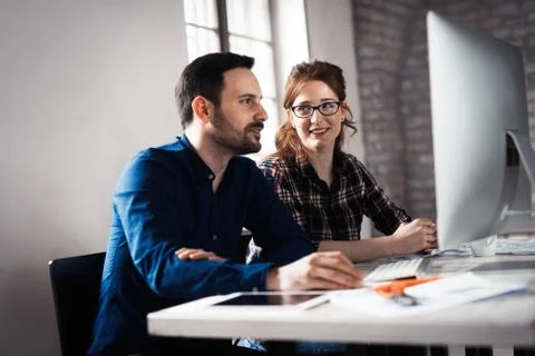Programmer working in a software developing company office Stock Photos