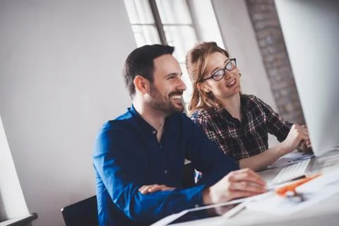 Programmer working in a software developing company office Stock Photos