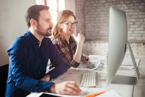 Programmer working in a software developing company office Stock Photos
