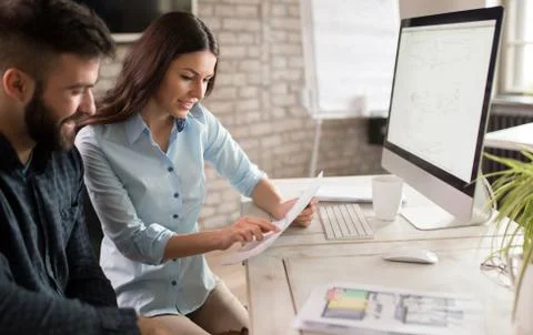 Programmer working in a software developing company office Stock Photos