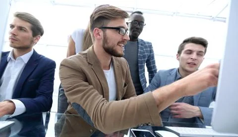 Programmer working in a software developing company office Stock Photos