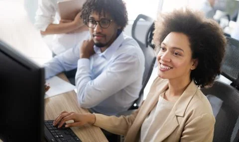 Programmer working in a software developing company office Stock Photos