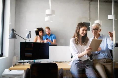 Programmer working in a software developing company office Stock Photos
