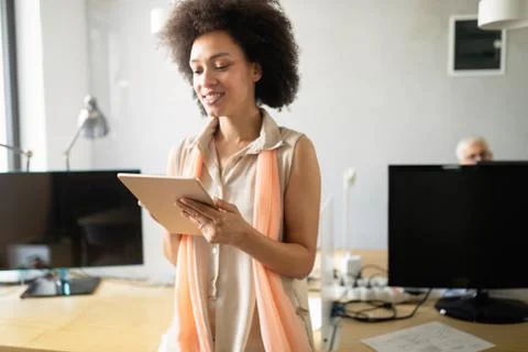 Programmer working in a software developing company office Stock Photos
