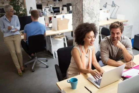 Programmer working in a software developing company office Stock Photos