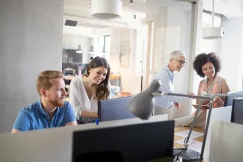 Programmer working in a software developing company office Stock Photos