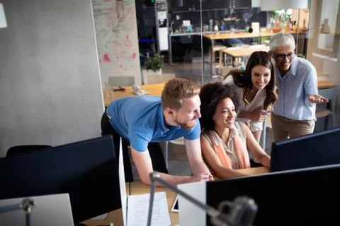 Programmer working in a software developing company office Stock Photos