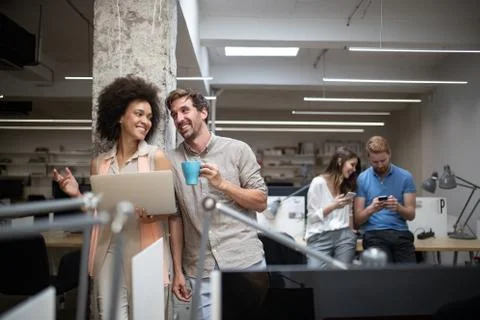 Programmer working in a software developing company office Stock Photos