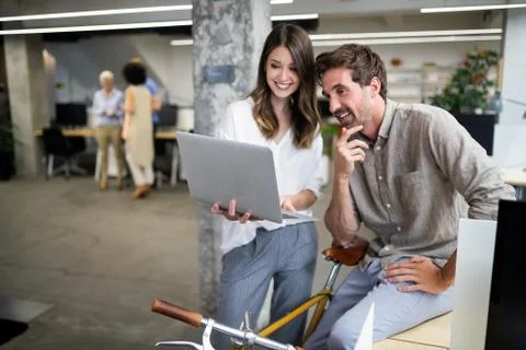 Programmer working in a software developing company office Stock Photos
