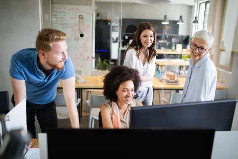 Programmer working in a software developing company office Stock Photos