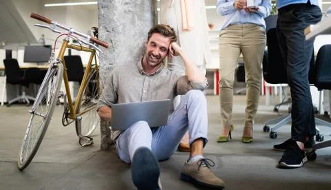 Programmer working in a software developing company office Stock Photos