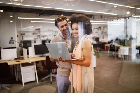 Programmer working in a software developing company office Stock Photos