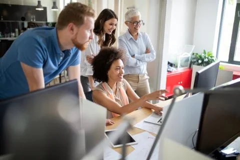 Programmer working in a software developing company office Stock Photos