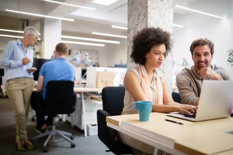 Programmer working in a software developing company office Stock Photos