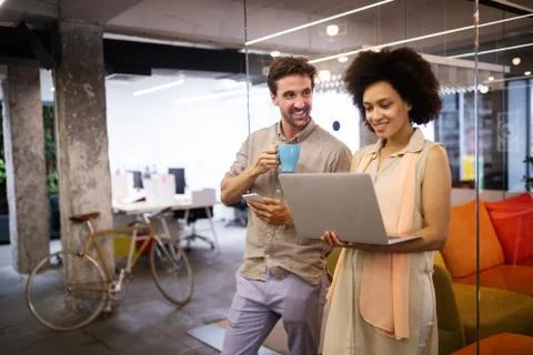 Programmer working in a software developing company office Stock Photos
