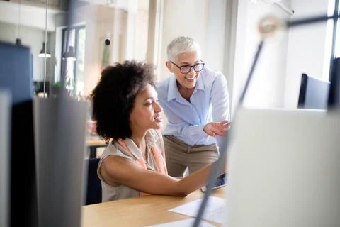 Programmer working in a software developing company office Stock Photos