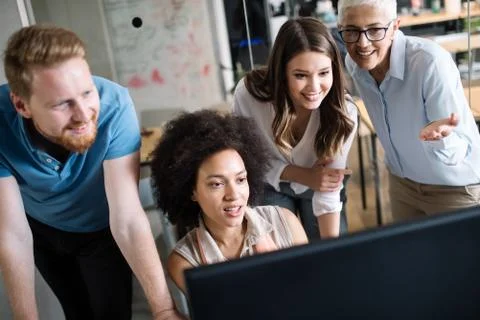 Programmer working in a software developing company office Stock Photos