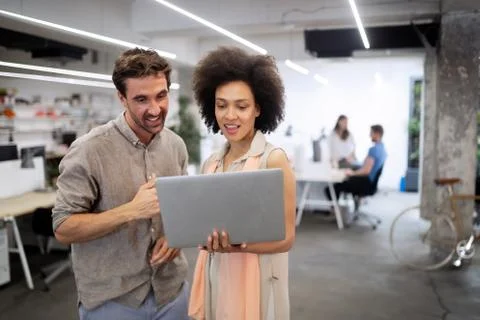 Programmer working in a software developing company office Stock Photos