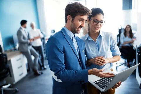 Programmer working in a software developing company office Stock Photos