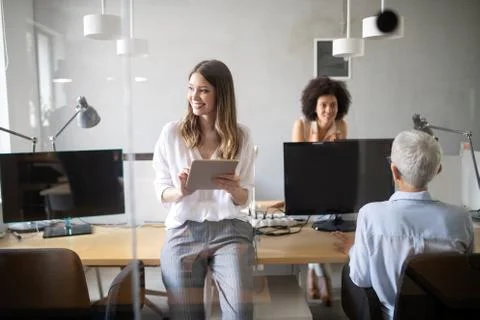 Programmer working in a software developing company office Stock Photos