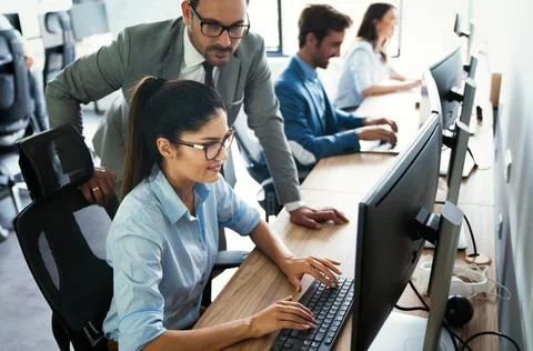 Programmer working in a software developing company Stock Photos
