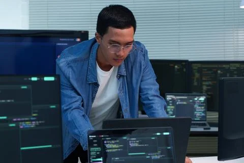 Programmer Working on Software Development and Digital Code Stock Photos