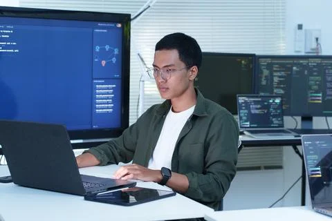 Programmer Working on Software Development and Artificial Intelligence Stock Photos