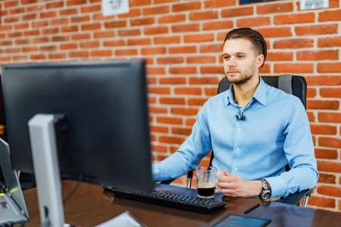 Programmer working in a software development company office. Website design. Stock Photos