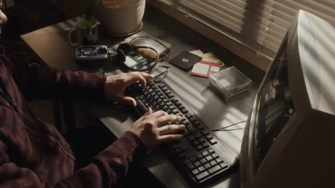 Programmer Working on Vintage Computer Setup Stock Footage 321985368