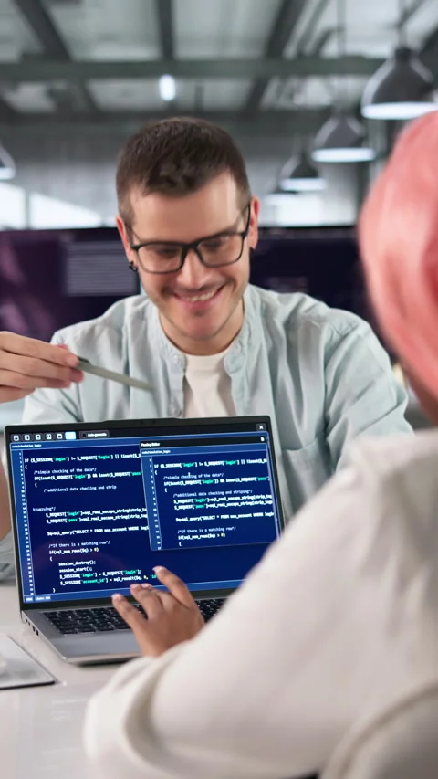 Programmer Writes Clean Code On Computer While Collaborating 스톡 동영상 333397852