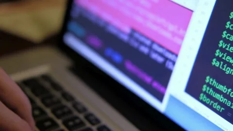 Programmer writes the code software developers working late back view Closeup Stock-Footage 334586154