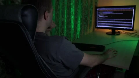 Programmer writes web html code virus. Password hacking. Tester looks for bugs Stock Footage 219624079