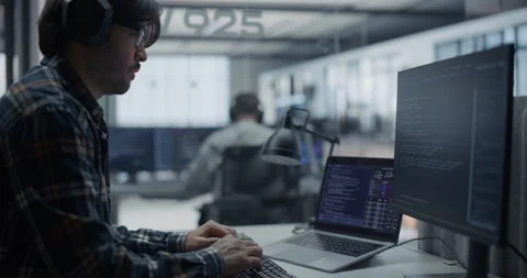 Programmer Writing Code on Computer Stock Footage 296184283